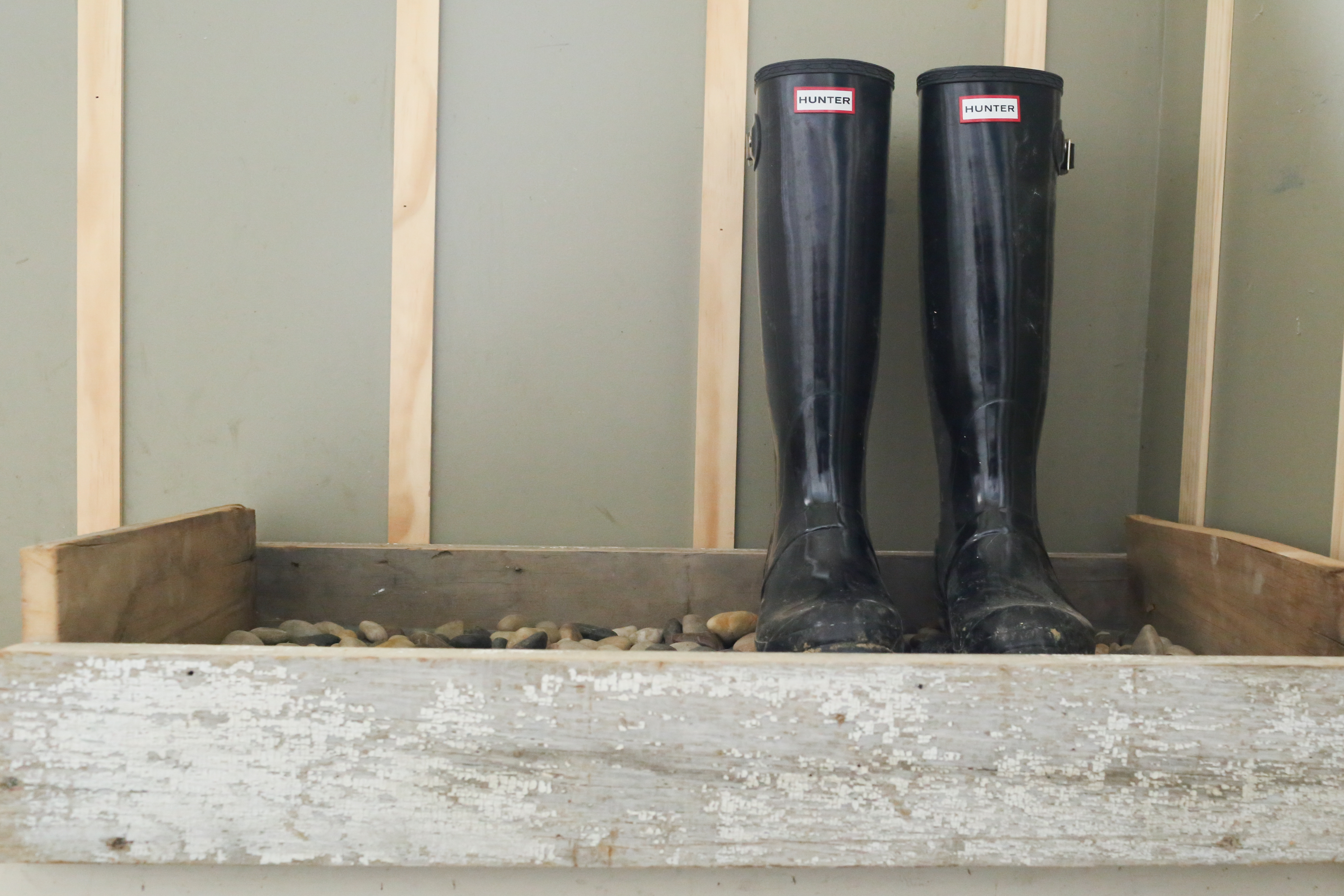 The farmhouse boot tray helps drain the boots and keeps them in place in style.