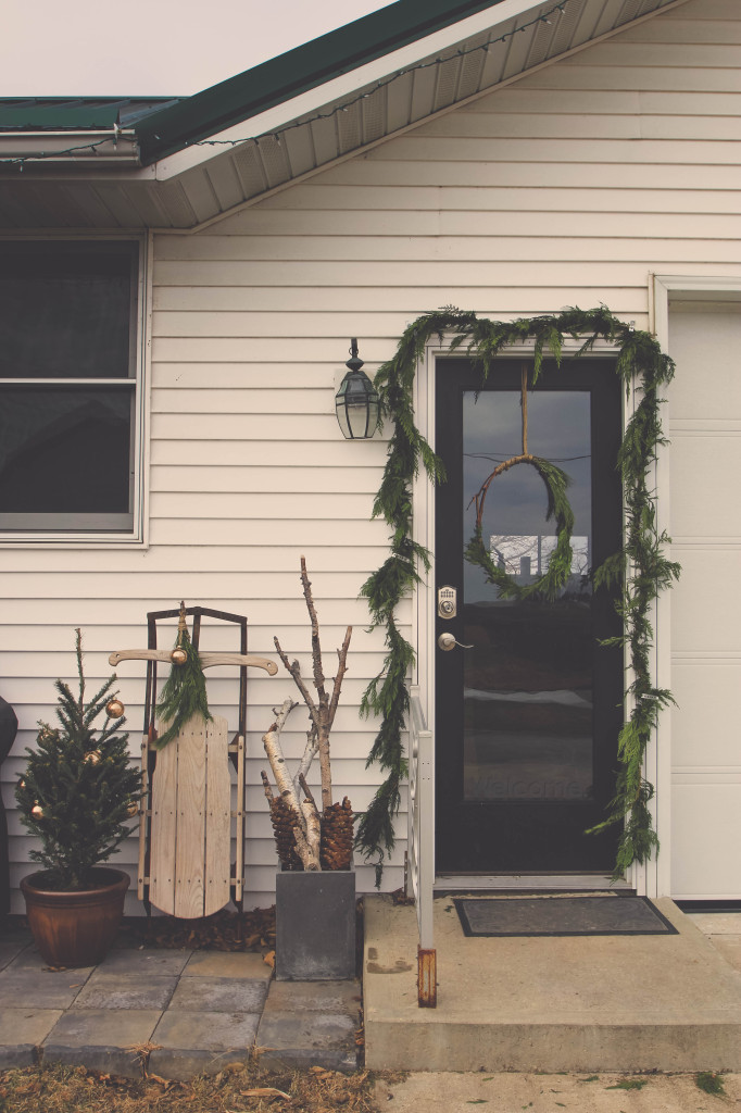 Five tips for decorating the outside of your home for the Christmas season.  #christmas #decorating www.homestead128.com