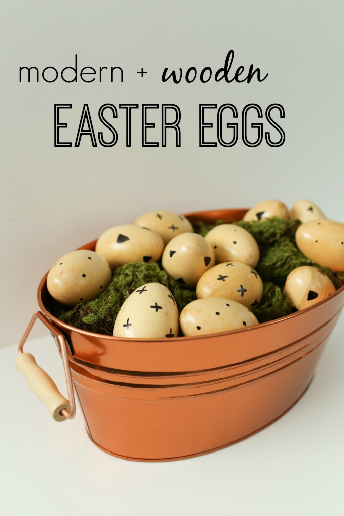 A modern take on Easter egg decorating using faux wooden eggs and a sharpie!  www.homestead128.com