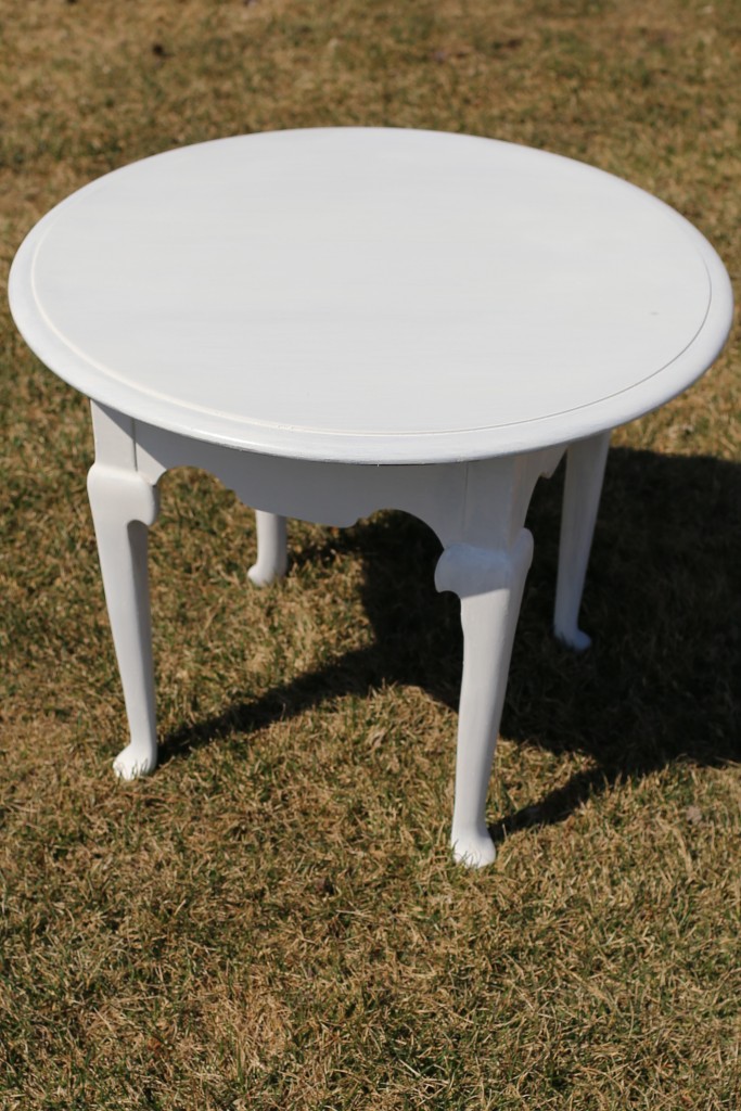 A sturdy end table is turned into a gray and gilded nightstand!  www.homestead128.com