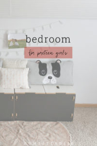 The shared girls bedroom has room for both play and homework.